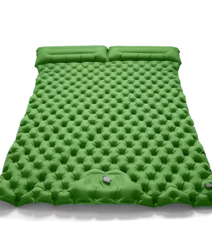 Double inflatable dot mattress in blue with the free air pump shown beside it.