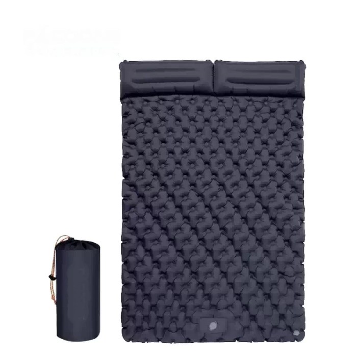 Extra wide double inflatable mattress shown spread out in the cargo area of an SUV for car camping.