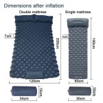 Double sleeping pad deflated and rolled up next to a standard hiking boot for scale.