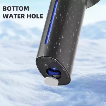 Close-up of the easy-to-fill water tank on a turbine spray mini fan for outdoor use.