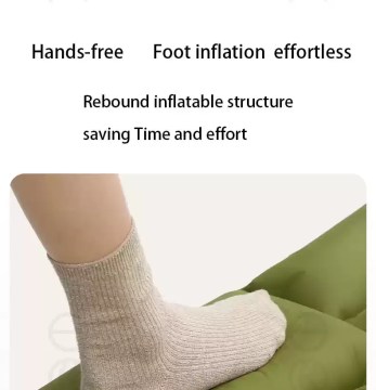 Detailed view of the dual-layered air valve on a portable sleeping cushion for fast inflation.