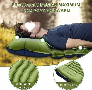 Blue camping inflatable air mattress shown fully inflated on a grassy campsite with a hiking rucksack.