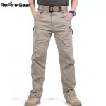 ReFire Gear men's khaki tactical cargo pants, full front view with hands in pockets.