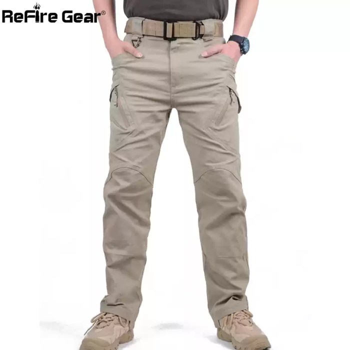 ReFire Gear men's khaki tactical cargo pants, full front view with hands in pockets.