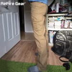 Man kneeling wearing ReFire Gear beige tactical cargo pants, highlighting knee seam detail and side pockets.