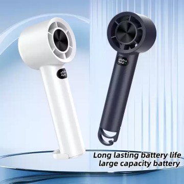 Handheld fan showing battery percentage on LED screen.