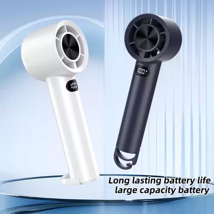 Handheld fan showing battery percentage on LED screen.