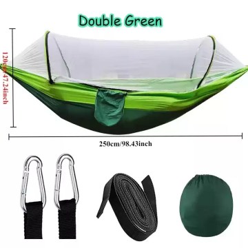 Reinforced carabiner and strap system on the protective outdoor camping hammock.