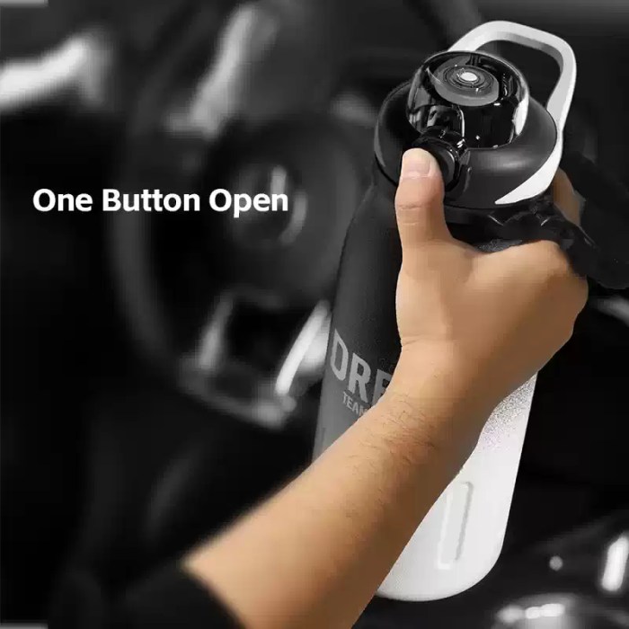 ONE HAND OPEN OUTDOOR PORTABLE THERMOS BOTTLE_2 One hand open outdoor portable thermos bottle used on a nature hike.