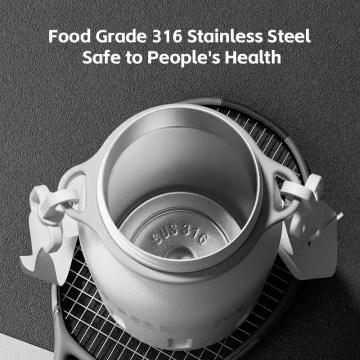 Close up of the one-click lid mechanism on a portable thermos.