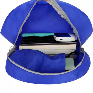 Foldable backpack interior with space for tablet and travel essentials