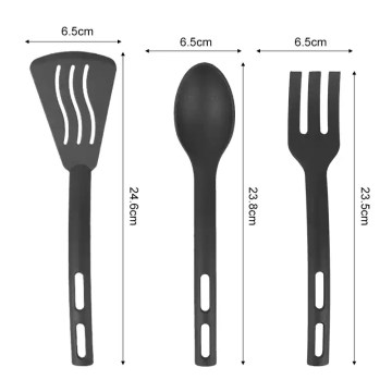 Cooking kitchen cutlery set laid out for a camping picnic.