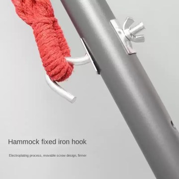 A child playing on the indoor home bracket hammock in a modern living room.