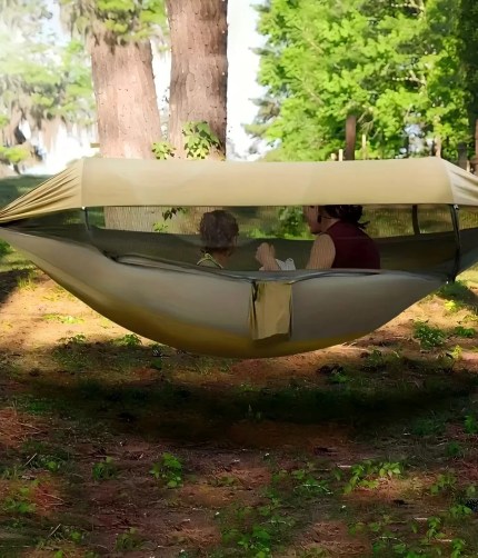 Portable camping hammock with mosquito net and green awning.