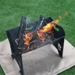 Small backpacking stove placed on a protective stove floor mat on a camping table.