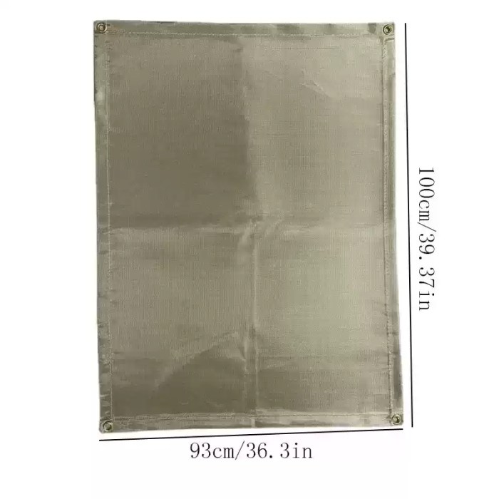 Temperature resistant insulation pad protecting a wooden patio deck under a portable BBQ grill.