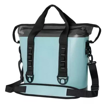 Blue TPU waterproof thermal bag kept on a picnic table during a nature hike.