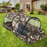 1-2 person camping mesh tent set up in a green forest for summer hiking.