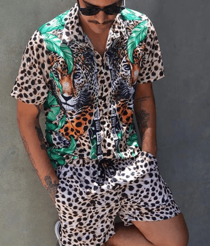 Men's bold leopard print matching outfit with a breathable shirt and adjustable shorts.