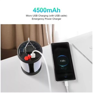 Rechargeable camping lantern hanging inside a tent for illumination.