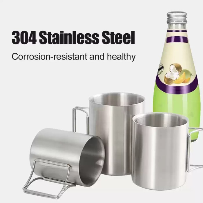 A hiker using the 400ml stainless steel coffee mug during a sunrise nature hike.