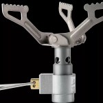 One-piece pocket stove shown next to a coin for scale.