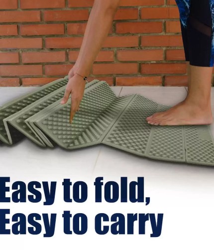A traveler inflating the waterproof outdoor sleeping pad inside a mountain tent.