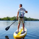 Secure buckle and roll-top closure on waterproof drybag for UK water sports.