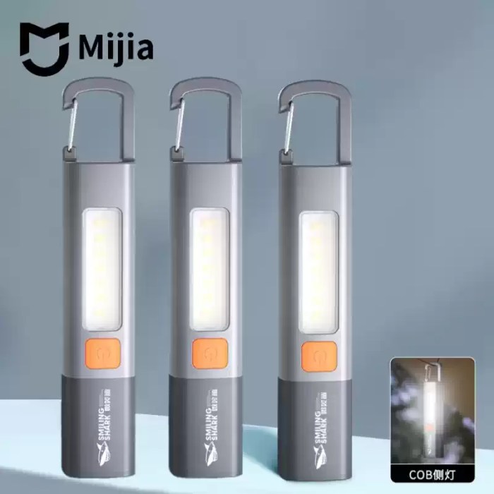 LED Flashlight with zoomable lens and USB charging port.