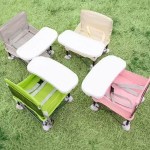 Stable baby beach seat with wide non-slip feet.