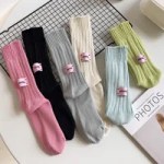 Knitted crew socks available in pink, black, grey, cream and green colours
