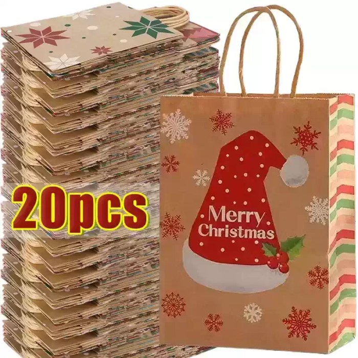 20pcs-christmas-gift-bags-santa-hat Pack of 20 Christmas gift bags with handles featuring a red Santa hat and snowflake design.