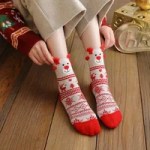 Festive Christmas socks for women with red patterns and cosy winter warmth