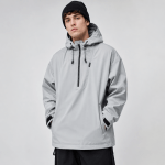 : Man wearing a grey oversized hooded ski jacket with black snow trousers