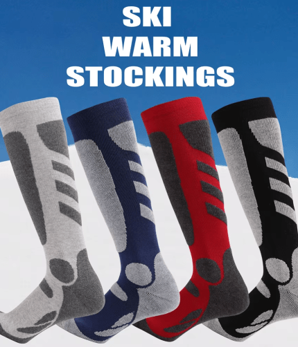 Knee-high thermal ski socks in blue, red, black and grey with reinforced heel and shin panels