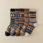 Five pairs of patterned knitted winter crew socks in black, grey, brown, taupe and cream colours
