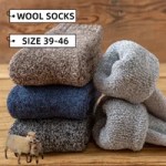 Thick wool winter socks stacked in assorted warm colours for cold-weather wear