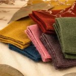 Knitted winter crew socks displayed in assorted warm solid colours