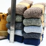 Thick wool winter socks shown with size and thickness comparison