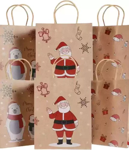 Christmas gift bags with handles featuring Santa, snowman, presents and festive cartoon designs.