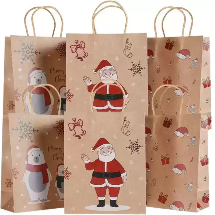 christmas-gift-bags-santa-snowman-designs Christmas gift bags with handles featuring Santa, snowman, presents and festive cartoon designs.
