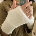 Fluffy knit fingerless gloves featuring a soft faux fur texture, rib-knit cuffs, and a thumb hole design for cozy winter wear.