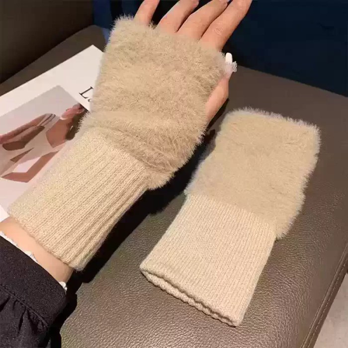 Fluffy knit fingerless gloves featuring a soft faux fur texture, rib-knit cuffs, and a thumb hole design for cozy winter wear.