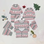 Flat lay show of complete matching family Christmas pajama set
