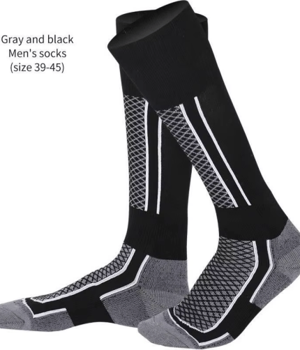 Knee-high ski and snowboard socks in black with reinforced patterned panels