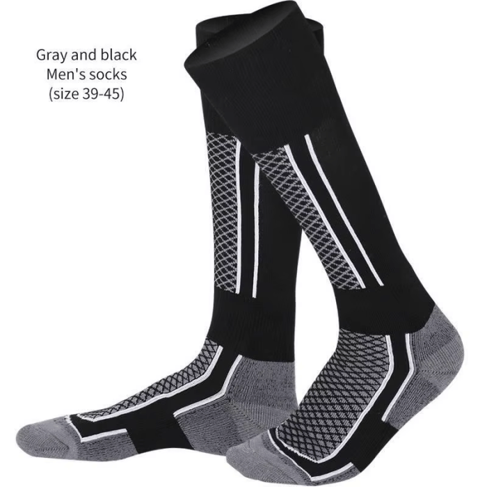 Knee-High Ski & Snowboard Socks Knee-high ski and snowboard socks in black with reinforced patterned panels