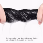 Close-up of fabric undergoing an environmentally friendly printing and dyeing process, demonstrating fade resistance.