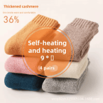 Four pairs of thick knitted winter socks in assorted colours with soft ribbed cuffs for cold-weather wear