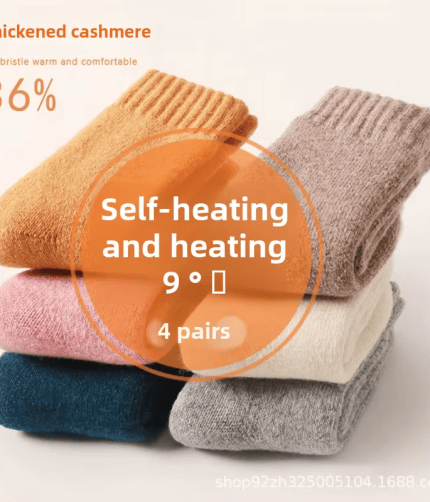 Four pairs of thick knitted winter socks in assorted colours with soft ribbed cuffs for cold-weather wear