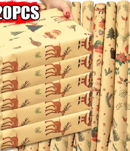 Stacked gifts and rolls of kraft Christmas wrapping paper featuring reindeer prints.